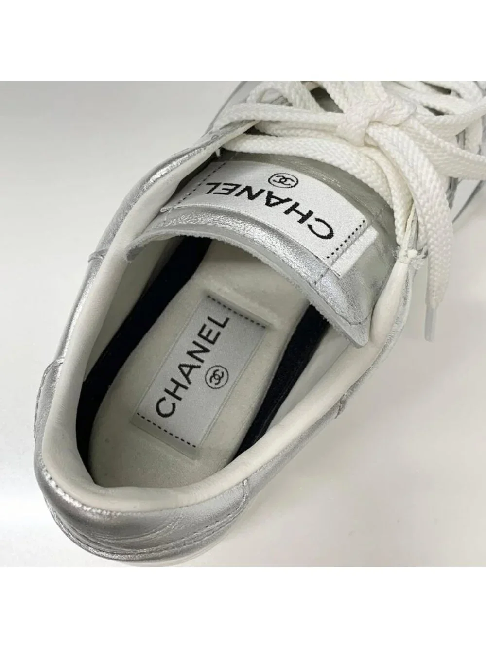 Chanel CC Logo Perforated Leather Sneakers Silver